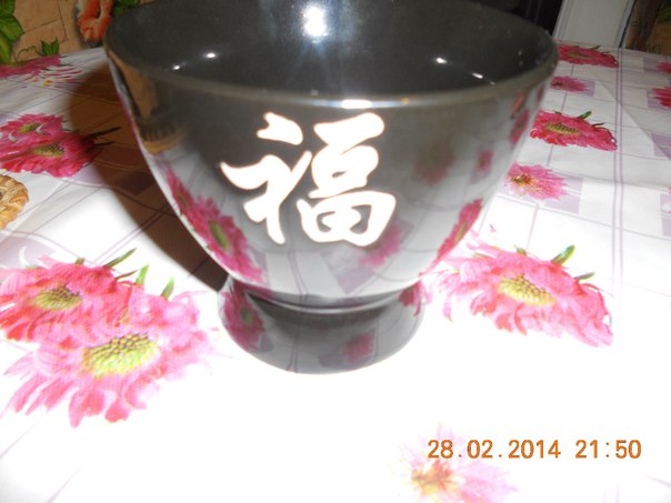 Китайський ієрогліф щастя на чашці